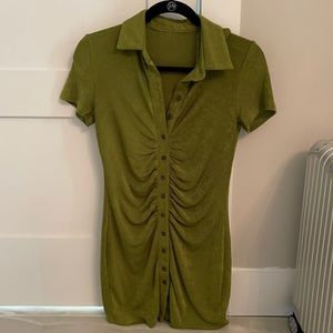Light green button down dress with soft material.